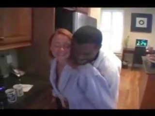 Middle-aged housewife and her black lover